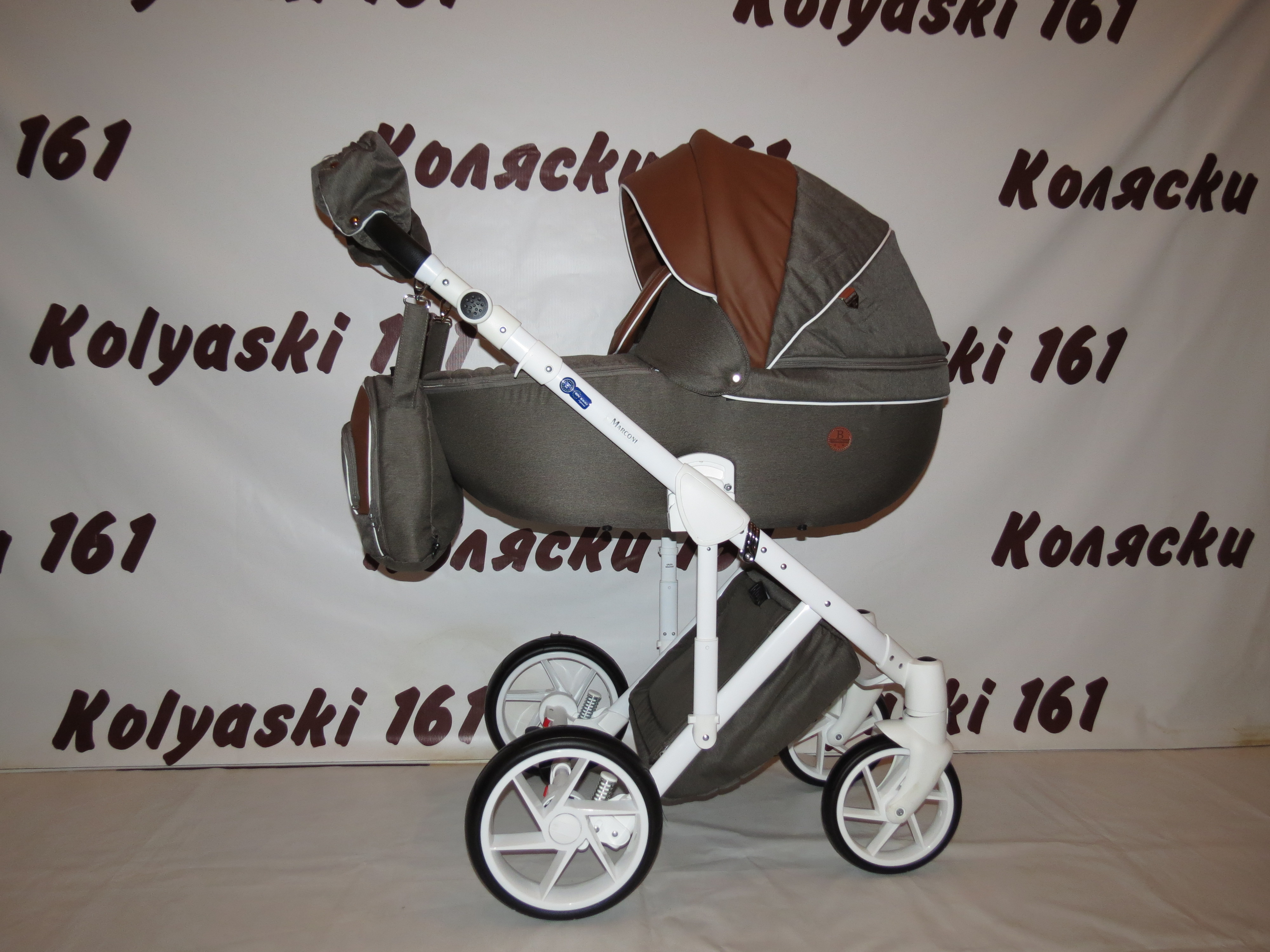 Bebe-Mobile Marconi BE 25 50 % кожаная детская коляска